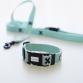 collar tape cross turquoise blue x black