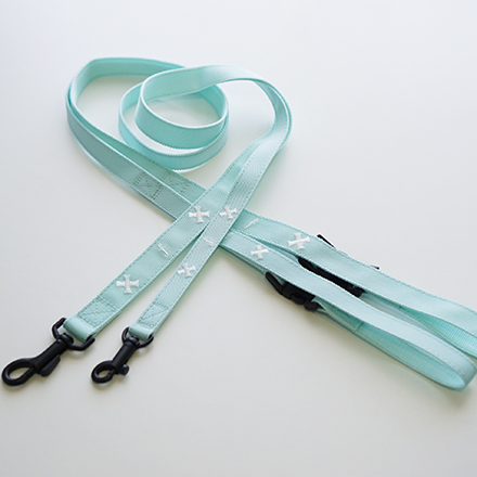 leash tape cross turquoise blue x white